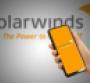 Solarwinds technology logo on smartphone screen in hand